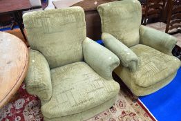 A pair of early 20th Century easy armchairs