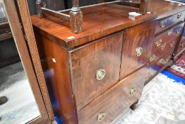 A 19th Century Regency design mahogany and rosewood commode, converted to drinks cabinet