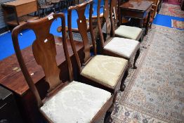 A set of four , and a similar pair of Georgian red walnut/mahogany dining chairs , all having scroll
