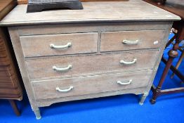 An early 20th Century stripped oak chest of two over two drawers, width approx. 89cm