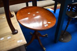 A reproduction Regency oval top occasional table