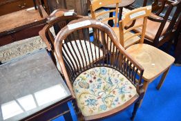 Two late Victorian/Edwardian mahogany and inlaid tub chairs with upholstered seats