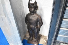 A vintage metal companion stand (no tools) modelled as Dutch boy, height approx. 47cm