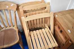 A set of beech folding chairs