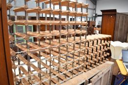 Two metal and wood wine racks, 64 and 24 bottle