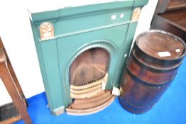 A traditional cast fire surround etc, overpainted in gold and green