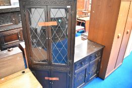 An old charm or priory style corner display and sideboard