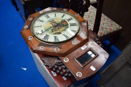 A 19th Century wall clock having painted dial depciting windmills with sail movement