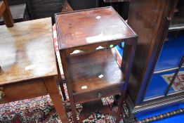 A Georgian mahogany two tier night stand