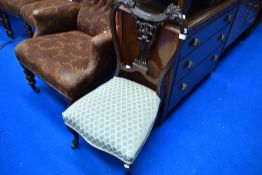 A Victorian mahogany salon chair having scroll and foliate back , later upholstered overstuffed seat
