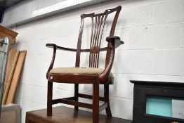 A George III mahogany armchair having splat back and woolwork seat