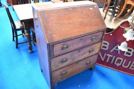 An early 20th Century Regency revival style bureau bookcase, with astral glazed section (glass af)