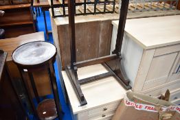 A mahogany cheval mirror stand