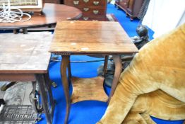An early 20th Century mahogany occasional table having shaped legs and undertier, width approx.