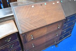 An early to mid 20th Century mahogany bureau