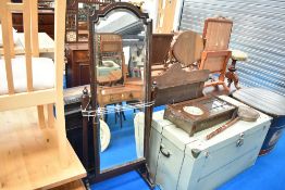 An early 20th Century oak cheval mirror