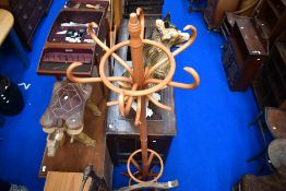 A modern beech effect hat stand