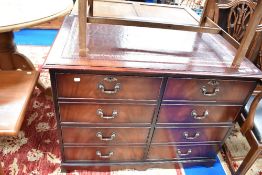A reproduction Regency desk style four drawer filing cabinet with four faux drawers, width approx.