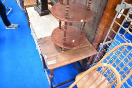 An early 20th Century occasional table and a reproduction three tier etage