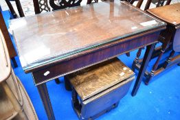 A George III mahogany fold over card table