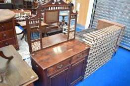 A Victorian mirror back sideboard having tiled and mirror back, width approx. 96cm