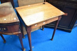A vintage oak school desk