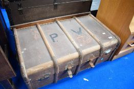 A vintage travel trunk, having initials to lid, PW