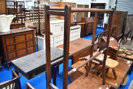 An Edwardian mahogany towel rail