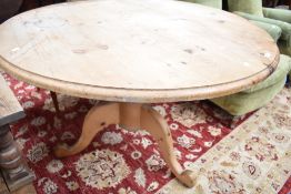 A natural pine pedestal dining table, diameter approx. 120cm