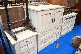 Three pieces of laminate bedroom furniture
