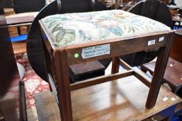 A 19th Century mahogany dressing stool with woolwork seat