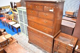 A George III oak chest of chest having brass drop handles and bracket feet