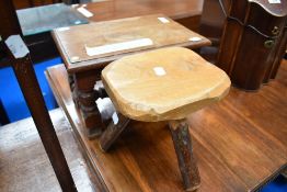 A rustic milking copy type stool and a small coffin type stool having turned frame