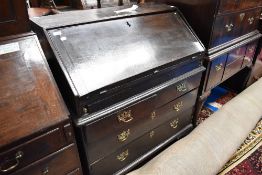 An 18th Century dark oak bureau