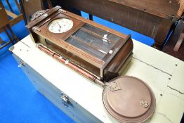 An early 20th Century mahogany cased wall clock and traditional copper warming pan