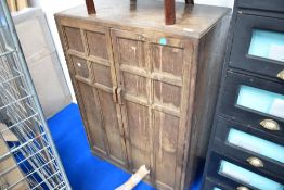 An early 2t Century oak cabinet
