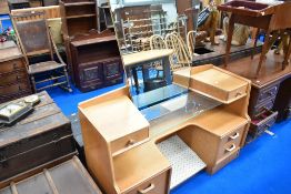 A mid 20th Century golden oak dressing table, E Gomme , G Plan