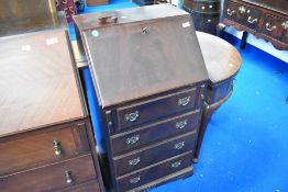 An early to mid 20th Century mahogany dwarf bureau