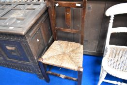 A 19th Century rush seated bedroom chair
