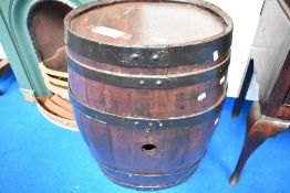 A traditional coopered barrel of oval form, height approx. 72cm