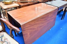 A 19th Century mahogany drop leaf dining table