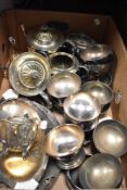 A selection of vintage silver plated table serving wares including sundae dishes, tea sets and