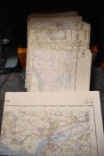 A stack of vintage ordnance survey guides and maps of Northern England.
