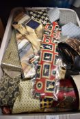 Approximately 100 vintage men's ties including printed designs and silk.