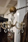 A vintage five branch chandelier with cut glass lustre drops.