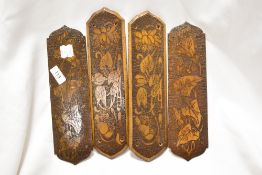 Two pairs of Victorian Arts and Crafts poker worked finger or door plates in art nouveau designs.
