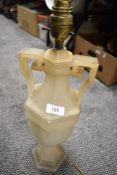 A vintage early 20th century stone carved lamp base in a Greek / Roman design 50cm tall.