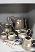A selection of antique pewter tea wares including J.H Potter and Craftsman.