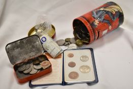 A selection of collectable coins and currency including Britain's first decimal coins.