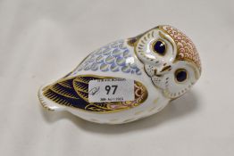 A Royal Crown Derby Gold stopper figure study of a reclining Owl,